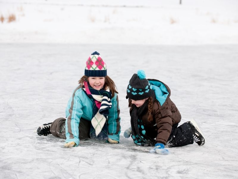 Ice skating toddler fall